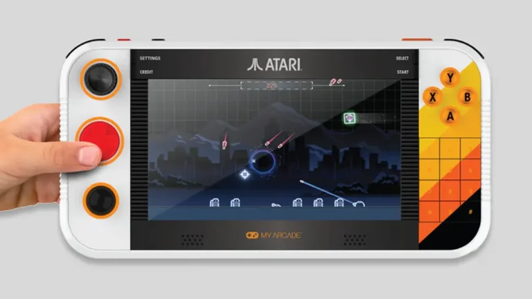 Atari Gamestation Go handheld console showing modern game on 7-inch display