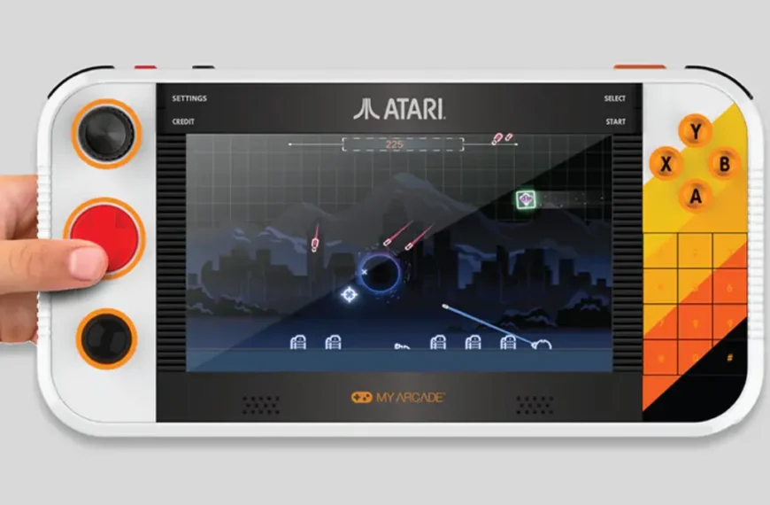 Atari Gamestation Go handheld console showing modern game on 7-inch display