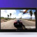 ROG Xbox Ally X gaming handheld front view with RGB joysticks and Xbox controls playing Forza Horizon